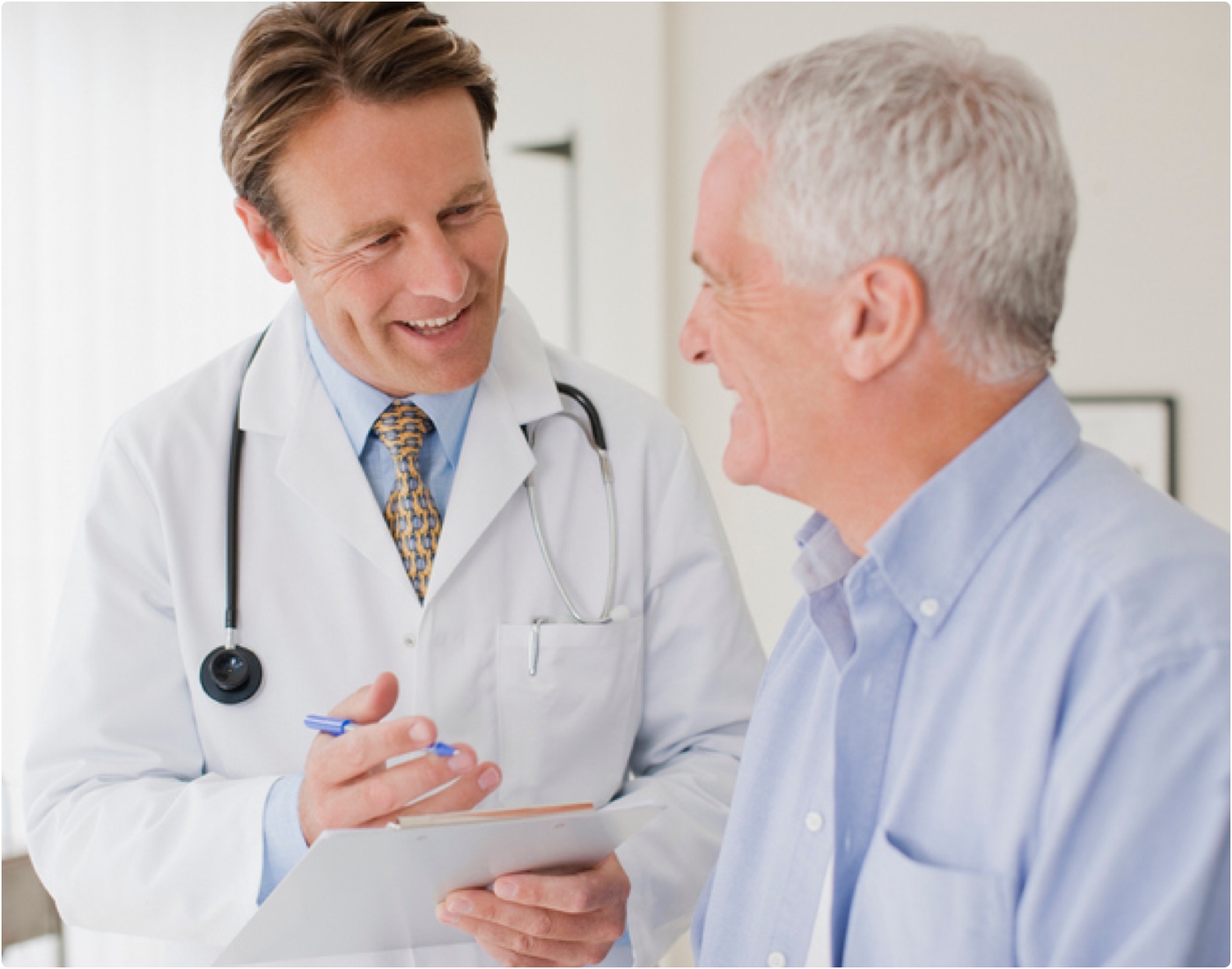 Stock photo of doctor with patient.